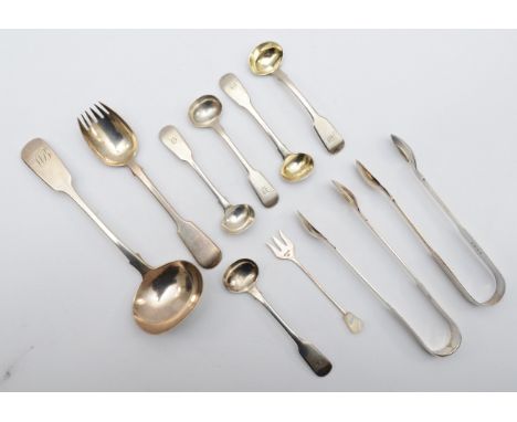 A Victorian silver gravy ladle, two sugar tongs and other flatware, 233gm 
