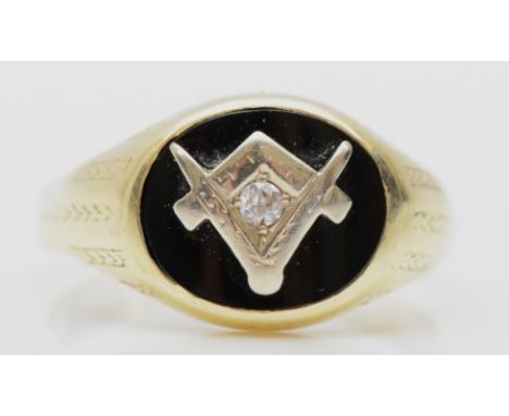 A vintage unmarked gold, black onyx and diamond Masonic ring, S, 4.9gm 