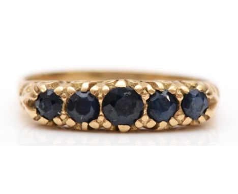 A vintage 9ct gold five stone sapphire ring, O,  2.1gm 