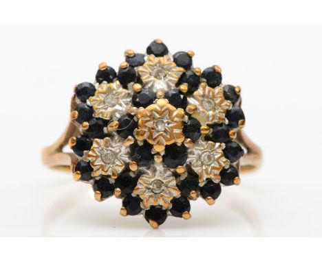 A 9ct gold sapphire and diamond large cluster ring, S, 4.1gm 