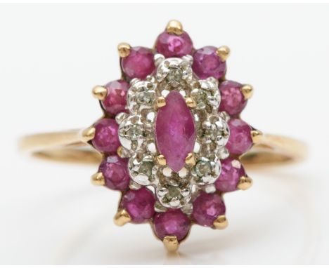 A 9ct gold ruby and diamond cluster ring, N-O, 2.2gm. 