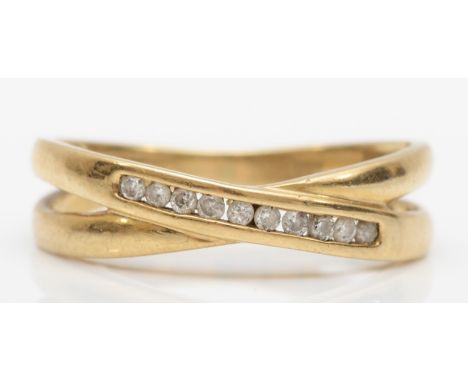 A 9ct gold and brilliant cut diamond ring, stated weight 0.10cts N, 2.1gm 