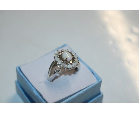 A Sterling silver opal and smoky topaz dress ring, ring size N