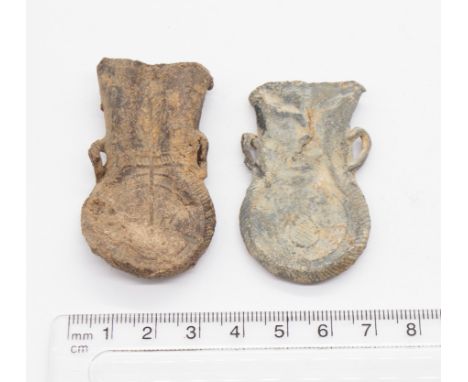 Pair of Medieval Pilgrims Ampulla.&nbsp; Circa 14th-15th century AD. Lead. The Ampullae were 'Holy Water' vessel purchased by