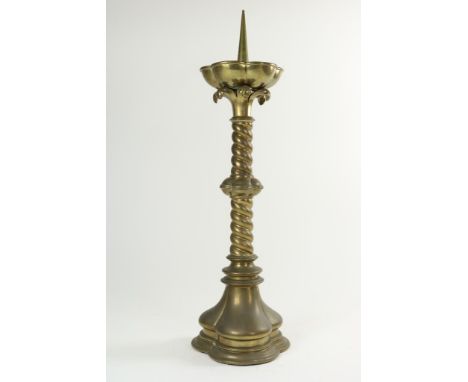 Copper one-light church candlestick on a twisted foot, h. 62 cm.Koperen eenlichts kerkkandelaar op gedraaide voet, h. 62 cm.