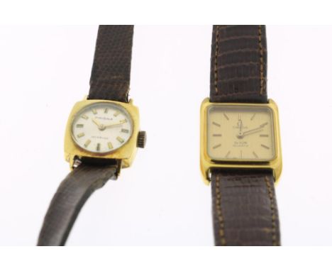 Two ladies wrist watches, one  rectangular, vermeil, Omega De  Ville, quartz and a round 14 krt gold, Prisma, manual winding,