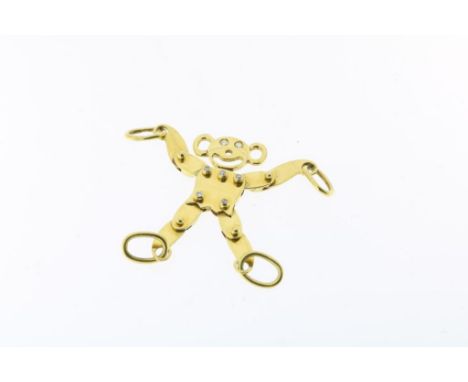 Yellow gold pendant, monkey puppet, eyes and body set with  brilliant cut diamonds, 750/000, gross w. 6.4 gr., max. length  4