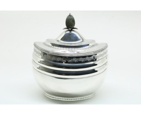 Sterling silver teacaddy, George III/Empire, with two  wide vertical bands, engraved decorations and a green enameld  pineapp