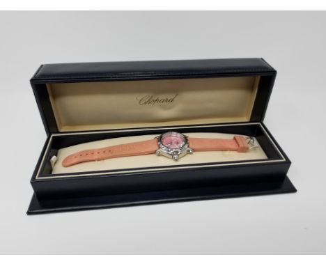 Chopard Ladies Pink 'Happy Sport' Watch. Having Chopard Happy Sport pink rubber straps. Watch face has two fish swimming, one