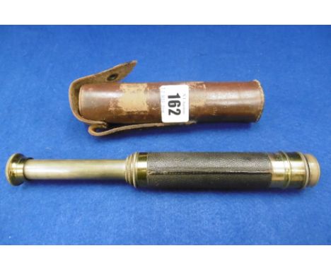 TELESCOPE FITTED WITH COMPASS