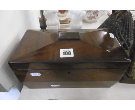 A GEORGIAN MAHOGANY TEA CADDY WITH LIMOGES DISH