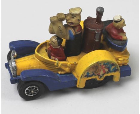 A Corgi Popeye paddle wagon, 802, a later painted Zebra Toys AA Motorcycle Patrol, a collection of boxed and unboxed Matchbox