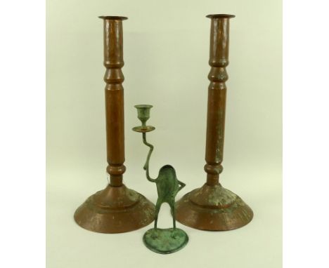 A pair of large beaten copper single sconce candlesticks, knopped stems, circa 1930s, together with an oxidised copper novelt