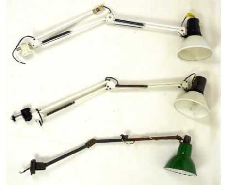 A group of three vintage industrial work-lamps, one circa 1930's with cantilever structure and cast iron base mount of painte