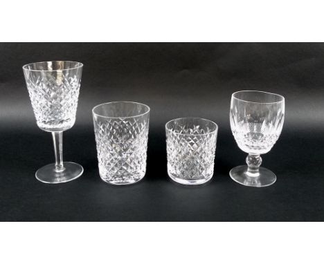 A suite of Waterford cut glass tableware, comprising six wine glasses, 12cm high, nine wine goblets, 13.5cm high, six water g