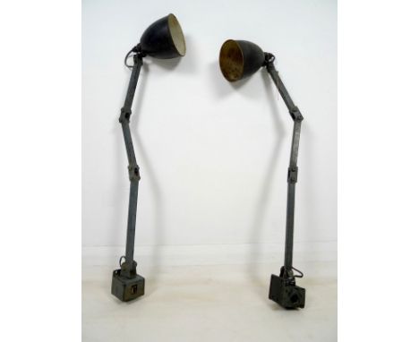 A pair of Memlite vintage industrial work-lamps, mid 20th century, machinist-engineer's with articulated joints, cantilever s