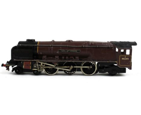 A group of Hornby Dublo OO gauge locomotives, rolling stock, accessories and track, including two 'City of London' tender eng