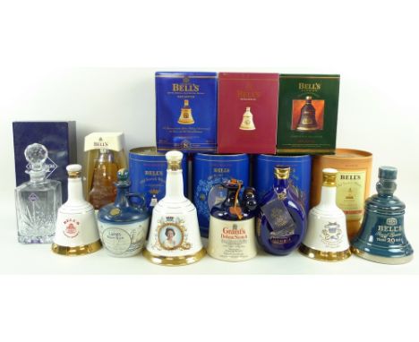 A collection of Bells Scotch Whiskey decanters, together with further alcohol and an Edinburgh Crystal decanter. (16)