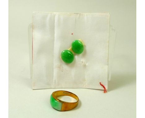 An 18ct gold ring set with green apple jade, size M/N, 3.6g, together with a pair of apple jade unset ovals, 10 by 13mm. (3) 