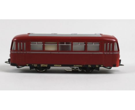 A group of vintage 1950's and 1960's Marklin Locomotives and track including a Shienenbus, number 3061, an  Elektrishche Rang