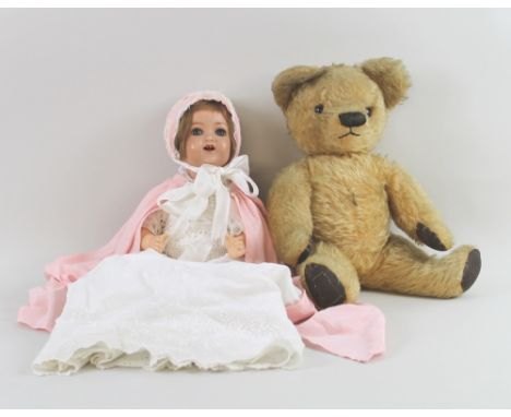 A Heubach Koppelsdorf 3423/0 bisque head doll with Broderie Anglaise original outfit and pink silk cloak, together with a 195
