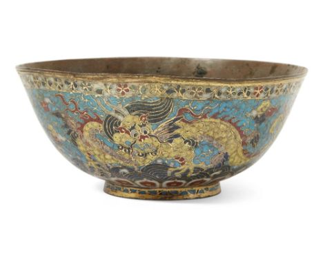 A Chinese 'winged dragons' cloisonné-enamel bowl, 16th century, finely enamelled around the exterior with a pair of sinuous w