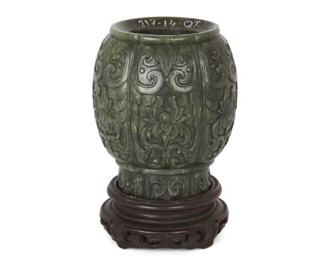 Property of a Gentleman (Lots 55-80)A Chinese spinach jade water pot, 18th/19th century, of lobed ovoid form, carved in low r