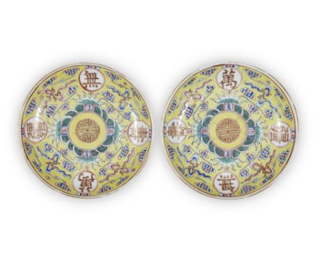 A pair of Chinese 'birthday' saucers, Guangxu marks and of the period, painted in famille rose enamels with four roundels eac