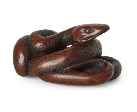 Property of a Gentleman (Lots 55-80)A Japanese boxwood snake netsuke, Edo period, 18th century, carved coiled with head raise