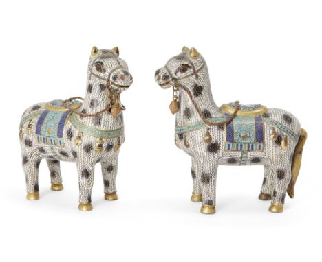 A pair of Chinese champlevé and cloisonné-enamel horses, 18th century, each modelled standing with mouth slightly opened, the