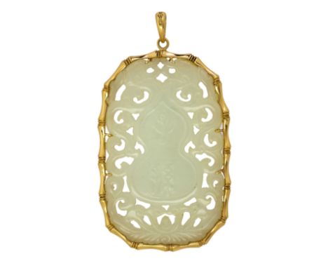 A Chinese pale celadon jade 'longevity' plaque, late 19th century, pierced and carved to the front and back with a double gou