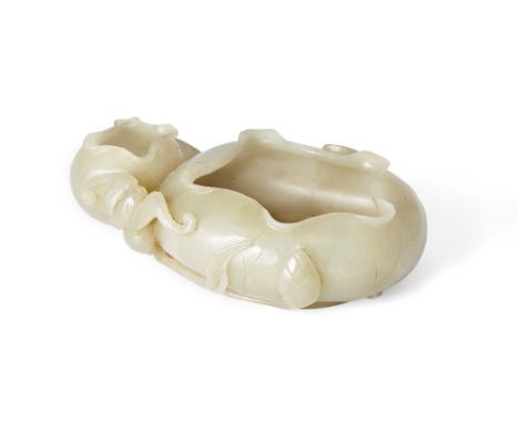 A Chinese green jade two-section 'lotus' brushwasher, late Qing dynasty, carved as two globular sections with a bat perched a