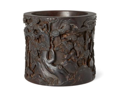 A Chinese zitan 'er lang sou shan' brush pot, 18th/19th century, finely carved with demons and warriors hunting in a pine for
