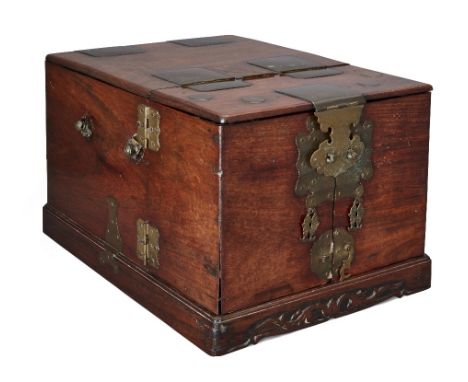 A Chinese hongmu and brass mounted travelling vanity box, 19th century, the hinged top enclosing hinged mirror and pair of hi