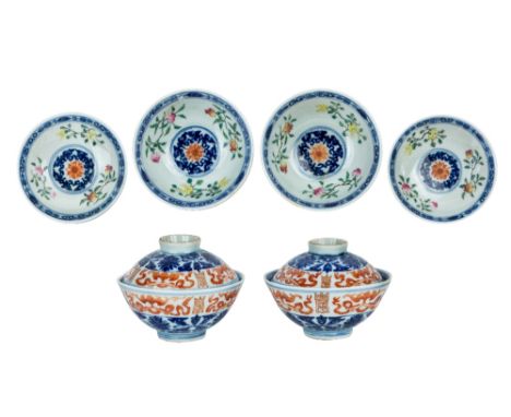 A pair of Chinese blue and white and famille rose tea bowls and covers, Jiaqing mark and of the period, each bowl with tapere