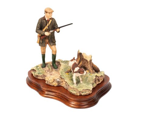  'Dogging 'Em Up' (First Version - Spaniels), model No. 112A by Ray Ayres, on wood base, with box; 'Reaching for the High Bir