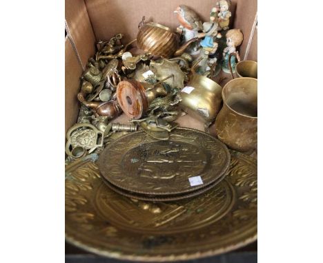 A box of assorted brass wares together with four ceramic figurines