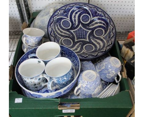 A quantity of blue &amp; white ceramic wares, includes bowls, meat dishes, etc.
