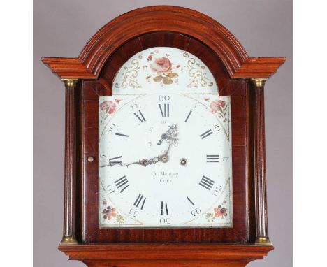 An early 19th century Irish mahogany longcase clock with eight day movement striking on a bell, the 12-inch painted breakarch