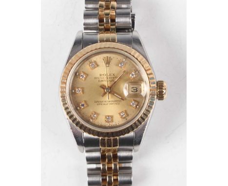A Rolex Oyster Perpetual Datejust steel and gold lady's bracelet wristwatch, Ref. 69173, circa 1990, with signed and jewelled