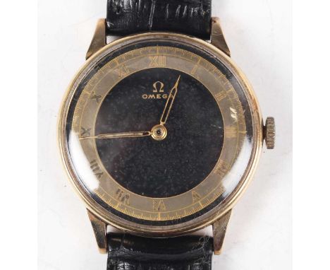 An Omega 14K gold circular cased gentleman's wristwatch, circa 1943, the signed and jewelled movement numbered '9847483', the