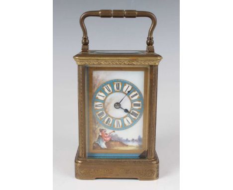 A late 19th/early 20th century French brass and Sèvres style porcelain carriage clock with eight day movement striking on a g