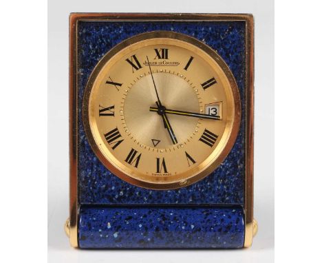 A Jaeger-LeCoultre gilt metal and simulated lapis lazuli folding travelling alarm clock, the signed gilt circular dial with b