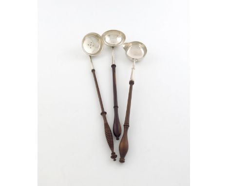 A small collection of three silver punch ladles, comprising: a George IV Scottish silver punch ladle, possibly by J. Howden, 