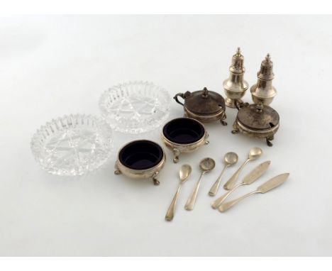 A mixed lot of silver items, comprising: two three piece condiment sets, by Mappin & Webb, Sheffield 1978, four condiment spo