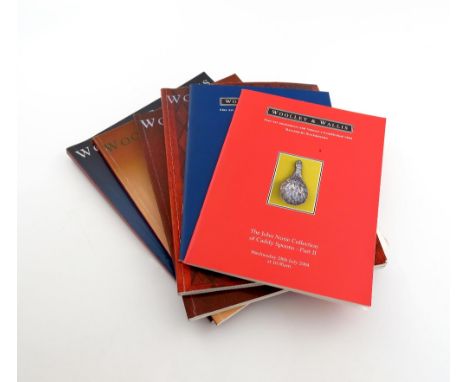 A quantity of Woolley & Wallis silver auction catalogues, including The John Norie Collection of Caddy Spoons, Part I and II,