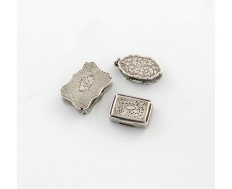 A small collection of three silver vinaigrettes, comprising: one of shaped oval form, by George Unite, Birmingham 1880, engra