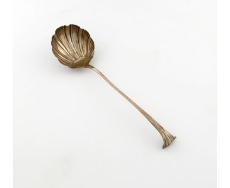 A George III silver Onslow pattern soup ladle, maker's mark C.B, London 1762, circular fluted bowl, the reverse of the termin