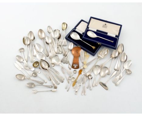 λ A mixed lot of silver flatware, various dates and makers, comprising: three caddy spoons, two cased spoons, a Tiffany chris