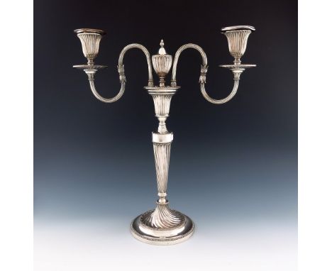 A George III old Sheffield plated single two-light candelabrum, probably by Winter and Co, circa 1780, tapering circular form